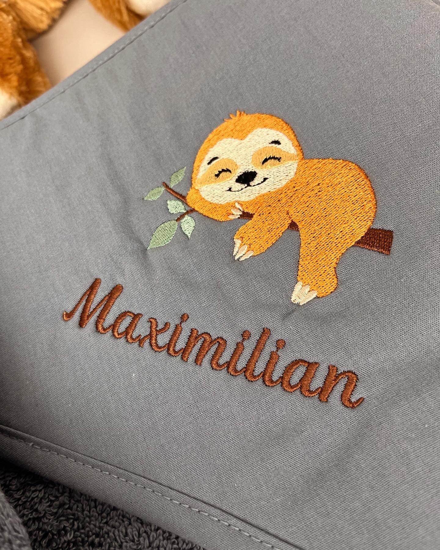 Kapuzenhandtuch FAULTIER